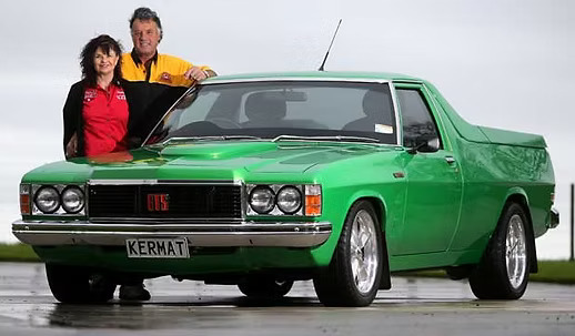 A long row of restored Holden cars